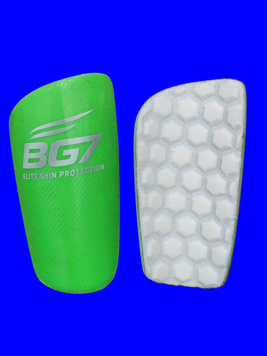 Green BG7 bite skin protection pad on a blue surface